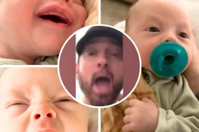 “Amid the heartwarming moments of baby Elliot’s first video, fans were shocked to catch a mysterious, brief cameo of Eminem — dressed in a black hoodie, sporting a thick beard and wide eyes. But that’s not all: in just a few seconds, he pulled off a funny, unexpected gesture that immediately went viral. What was Eminem up to behind the scenes? Why the sudden burst of humor from the usually serious rap legend? This mysterious, playful cameo has fans buzzing with questions and countless theories about what it all means…”