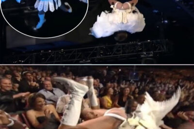 “Justin Bieber Falls into Eminem’s Lap Mid-Performance – Fans Can’t Stop Laughing at the Awkward Angel Suit Moment!”