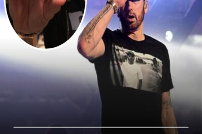 The 45-year-old Eminem shows a special Alcoholics Anonymous coin to announce that he has been sober for 10 years