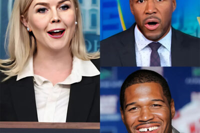 Karoline Leavitt stormed onto GMA — But one calm line from Michael Strahan changed everything.  She walked onto the stage confidently, ready to take charge. Yet, within seconds, Strahan’s calm words had left Karoline speechless — right on national television. The silence that followed was deafening.  When she finally walked out, she brought with her something no one expected: a shocking new nickname that instantly went viral, leaving fans and critics stunned.  Now, the internet is exploding, calling it “the most shocking TV takedown in years.”  What exactly did Strahan say to end her cold? And what was that unforgettable nickname that people couldn’t stop repeating? The answer is perhaps even more surprising than the moment itself.