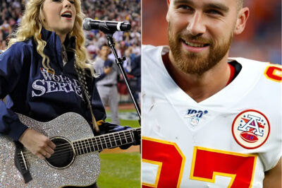 Taylor Swift will sing the national anthem for the Kansas City Chiefs? Travis Kelce is reportedly the one making it happen. In a move that’s sending shockwaves through the NFL, Swift will reportedly perform at a Chiefs game next season—all at Kelce’s bold request. But what sparked this unexpected collaboration, and how did fans react to seeing Swift step onto the field in a whole new spotlight? The story behind the unexpected moment is even more interesting than it sounds.