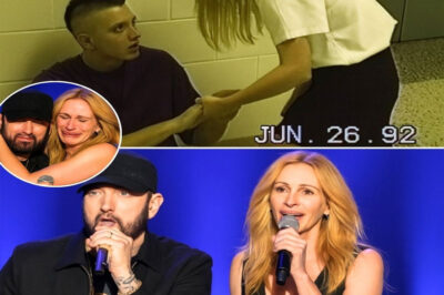 Eminem HALTS Detroit Concert in Tears — What He Did for the Woman Who Once Saved Him from Bu,llies Left Fans Sobbing, Security Frozen, and the Internet Absolutely Shattered! “He found her… where no one thought to look.” Before he was Eminem, before the fame, before Lose Yourself — he was just Marshall, a quiet kid from Detroit who got mocked for his clothes, his accent, his dreams. And there was only one person who ever stood up for him — a girl who shared her lunch and whispered, “Don’t let them break you.” Then one day, she was gone. No goodbye. No trace. Decades later, backstage at a Detroit arena, he saw her again — older, fragile, pushing a mop. Life had been cruel: debts, bruises, nights without hope. She barely met his eyes when she said, “I watch you on TV sometimes… you made it.” Eminem froze. The next night, in front of 20,000 screaming fans, he stopped his show mid-song. “There’s someone here tonight who once saved me when no one else would,” he said, voice trembling. When she stepped onto the stage, the arena fell silent — and then erupted in tears. Eminem dropped to his knees, hugged her, and said, “You told me not to give up. Now it’s my turn to tell you — you’re not done yet.” Cameras flashed. Fans cried. And for a moment, Detroit witnessed something bigger than fame — a circle completed, a life redeemed, and a legend remembering where his heart truly began.