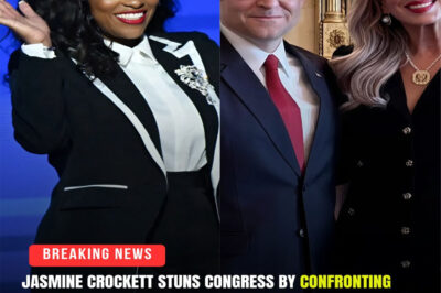 Gasps echoed through the chamber as Rep. Jasmine Crockett leaned forward, her voice cutting through the tension like a blade. “So, Mr. Speaker,” she said, eyes locked on Mike Johnson, “care to explain your wife’s hidden LLC?” The room fell silent — staffers froze, reporters stopped typing