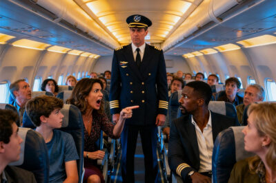 During a flight, I politely refused to give up my window seat. The woman next to me snapped, shouting, “You’re heartless! My son deserves this seat!” A tense silence filled the cabin — until the cockpit door opened and the captain stepped out. What he said next made the entire plane go completely silent.