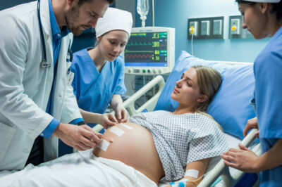 While changing the bandages of a young woman who had been in a coma for three months, the doctor froze in shock — her belly was growing larger each day. The truth behind what happened would soon bring the entire hospital to tears.