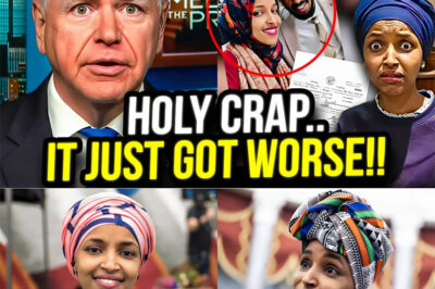 “MAKE MONEY Tim Walz GREAT CRIMINAL as Ilhan Omar INVESTS!!! A clip is circulating on social media that shows Governor Tim Walz “accidentally admitting to potentially illegal behavior” on air, while Ilhan Omar is said to be “de-escalating” in a confusing way. Supporters call it a conversation, while the other side claims “there is evidence”. In the end, what is the truth behind this viral video?”