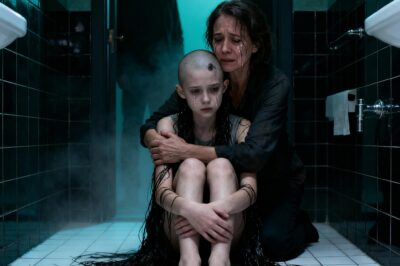 “When I returned home, I found my daughter soaked, trembling, with the hair she loved so much shaved down to the scalp. She was crying, unable to breathe. I asked what happened, and she could barely say it: ‘Dad… and my sister.’ I felt something break inside me. I didn’t scream. I didn’t argue. I hugged my daughter and made a cold decision. My husband didn’t fear screams or tears. He feared losing everything. And that was exactly what I was going to make happen.”