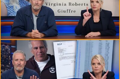 3.1 billion views in just 48 hours. On Voice of Freedom, Jon Stewart stunned the studio when he cornered Pam Bondi into acknowledging that power had deliberately concealed the truth—before delivering a chilling challenge: “Want to know who’s guilty? Open the book and read.”