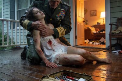 For two decades, I was the neighbor no one noticed—the quiet man who trimmed his hedges, fixed bikes, and never argued. But the night I found my daughter collapsed on my porch at midnight, shaking and bleeding after her husband threw her out, something in me cracked beyond repair. I tucked her into bed, reached for an old baseball bat, and drove straight to his house. He opened the door expecting my daughter on her knees, begging. Instead, he came face to face with a father who had nothing left to fear.